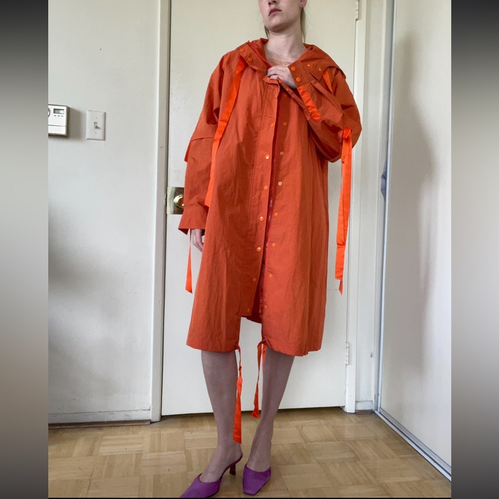 Hooded orange parka